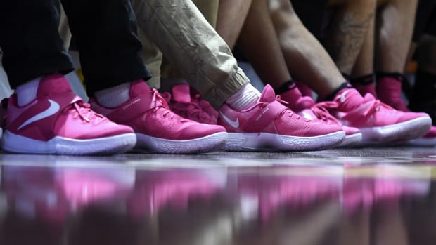 Jan 29, 2017; Blacksburg, VA, USA; Members of the Virginia Tech Hokies bench wear pink shoes to honor breast cancer awareness during the game against the Boston College Eagles at Cassell Coliseum. Mandatory Credit: Michael Shroyer-USA TODAY Sports